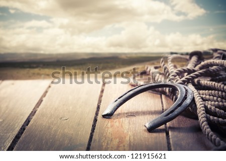 Lucky horseshoe on a porch Royalty-Free Stock Photo #121915621