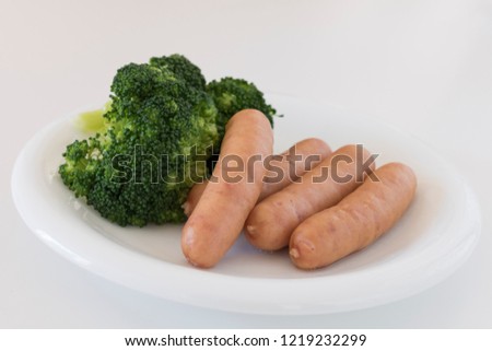 Served sausage and broccoli