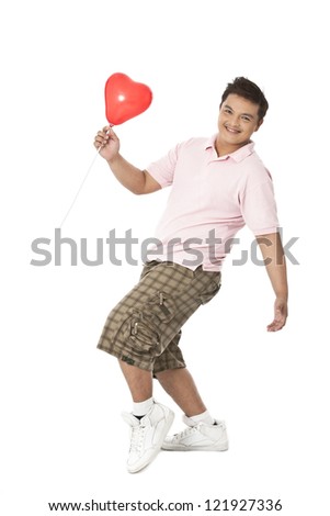 Image of happy guy with red balloon isolated on white background