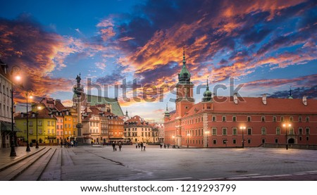 Panorama of the old town in Warsaw (Warszawa), Poland. The Royal Castle and Sigismund's Column called Kolumna Zygmunta at sunset. Historic Center is UNESCO World Heritage Site. Royalty-Free Stock Photo #1219293799