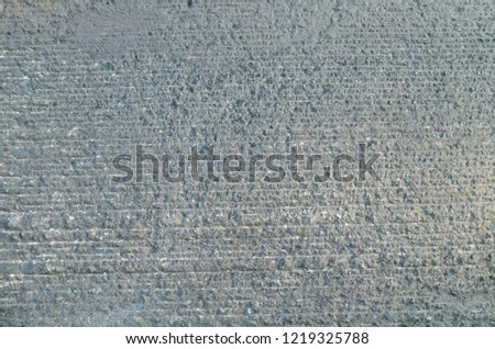 Rough Textured Horizontal Striped Concrete Close Up Background