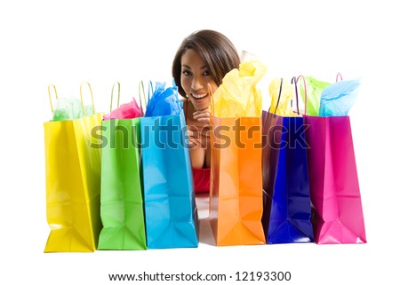 An isolated shot of a black woman with shopping bags