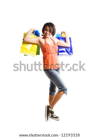 An isolated shot of a happy african american woman shopping