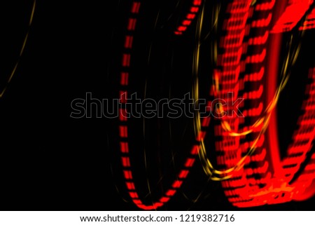 Abstract creative curve, shiny stripes on a black background. Background. Texture.