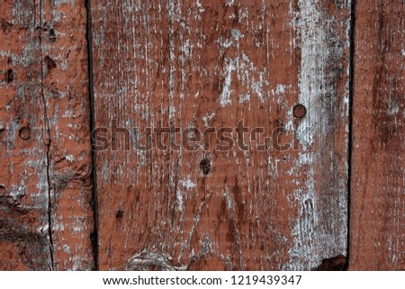 
Old plank wooden wall background. The texture of old wood. Weathered piece of wood.