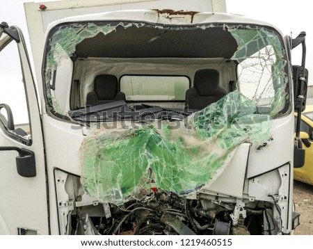 windscreen of a truck is completely smashed  in a deadliest road accident  