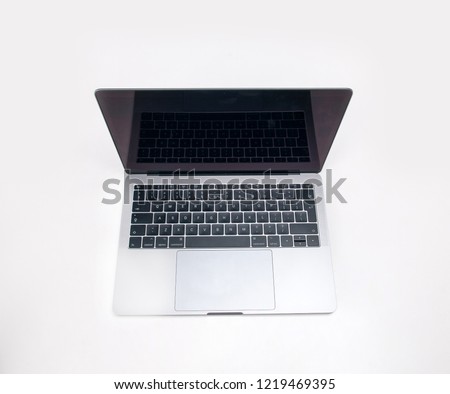 Silver laptop on white background