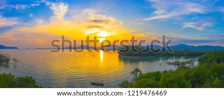 mangrove forest in sunset beside Mudong canal
 aerial photography mangrove forest in sunset beside Mudong canal Phuket