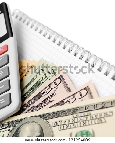 Money and the calculator for a notebook.