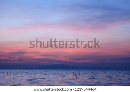 Breathtaking blue and purple color of the cloud layer on sunrise sky over the Gulf of Thailand