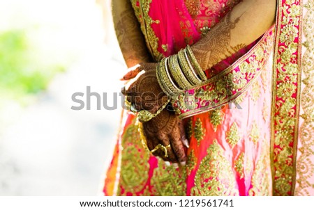 indian Pakistani Bride Showing her dress and jewelry