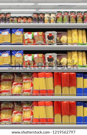 Close up/Mock up Pasta packing on a shelf in a supermarket. Suitable for presenting new packaging designs and product among many others  Royalty-Free Stock Photo #1219562797