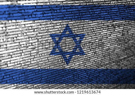 Israel flag  is depicted on the screen with the program code. The concept of modern technology and site development
