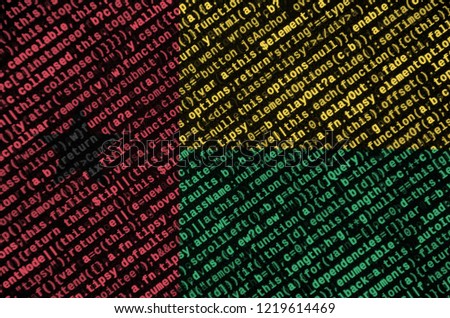 Guinea Bissau flag  is depicted on the screen with the program code. The concept of modern technology and site development