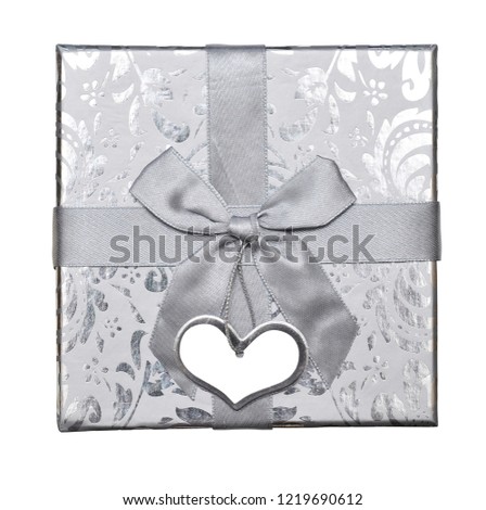 Silver gift box with bow and tag. Isolated on white background. Saving clipping paths.