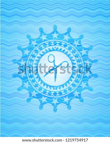 scissors icon inside water wave representation emblem background.