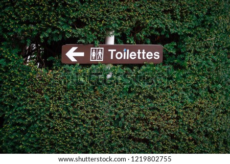 Toilet information sign.
