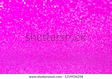 Blurred blaze pink deep glitter christmas texture backdrop. Hot red purple abstract photo of bokeh lights.