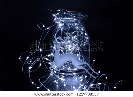Christmas composition of bulbs. light bulb garland in the Bank on a black background
