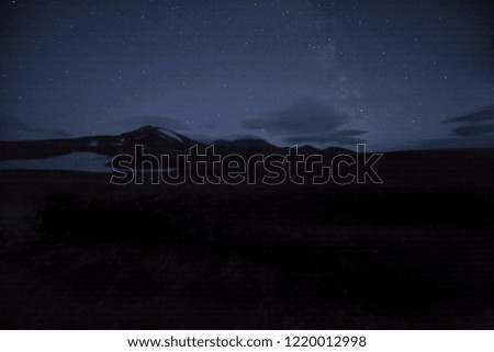 mountains in the clouds at night
