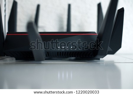 Triband internet wifi router in the office cyber secure  Royalty-Free Stock Photo #1220020033