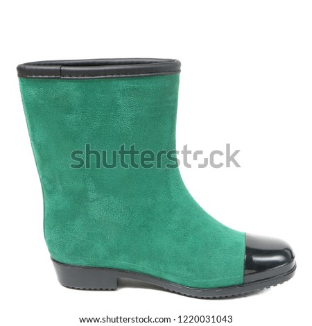 Women's rain boots isolated on white background.