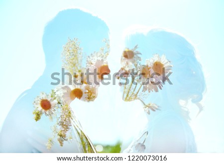 Man and woman love and hugs, close relationship and love, perfect couple double exposure photo. Couple in love on the background of the sky of flowers and water