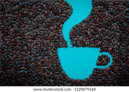 Concept idea: installation coffee seed for a blue cup of coffee.