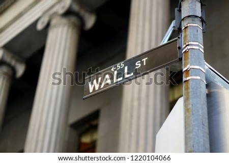 Wall Street sign in downtown Manhattan, New York, USA