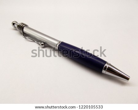 Close up photo about a very elegant and feminine pen.