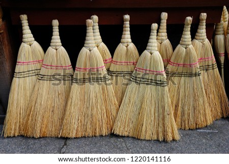 Turkish style brooms traditionally made using broom corn or sorghum at the market in Trabzon Royalty-Free Stock Photo #1220141116