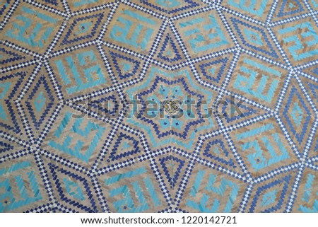 Eastern ornament on the wall with the inscription Allah, Registan, Samarkand
