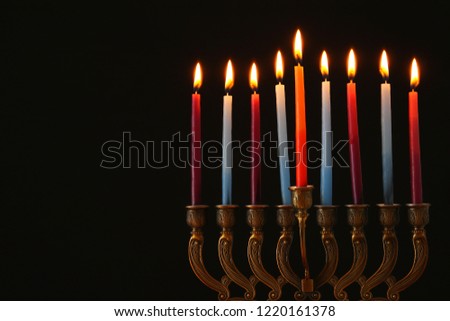 image of jewish holiday Hanukkah background with menorah (traditional candelabra) and candles