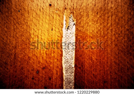 Old plank wooden wall background. The texture of old wood. Weathered piece of wood. Intentional colour shift.