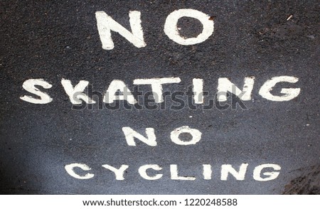 No Skating No Cycling road marking