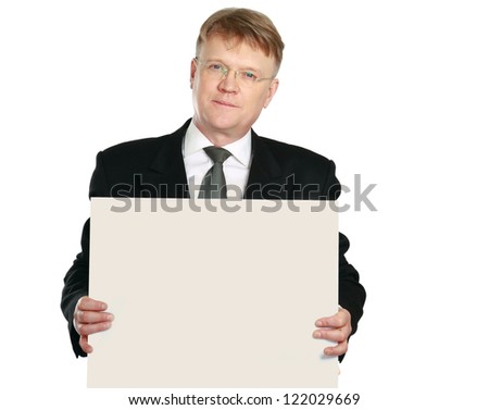 Businessman holding a banner ad isolated on white background