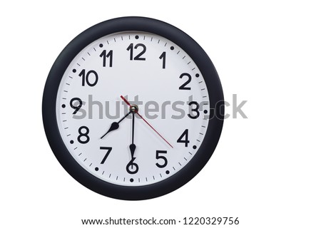Time concept with black clock at  half past seven Royalty-Free Stock Photo #1220329756