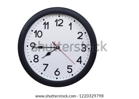 Time concept with black clock at a quarter to eight Royalty-Free Stock Photo #1220329798