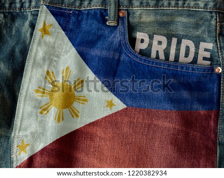 Republic of the Philippines flag with pride word on denim blue jeans background concept.