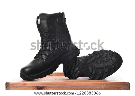 The hi cut safety tactical boot isolated on white background