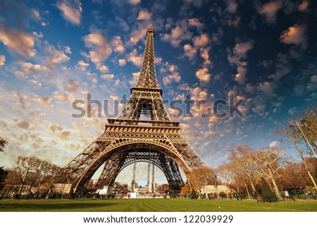 Paris. Beautiful view of Eiffel Tower with sky sunset colors.