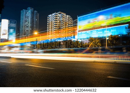 the light trails on the modern building background
