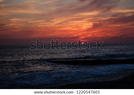 fabulous red, burgundy sky.  Sunset on the sea.