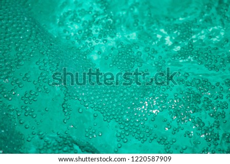 Abstraction. Air bubbles in rough water