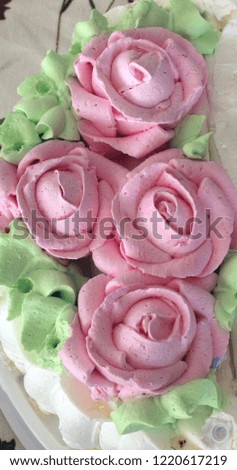 delicate cake with pink roses for the holiday