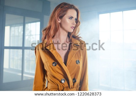 A film scene with a mysterious woman in a coat