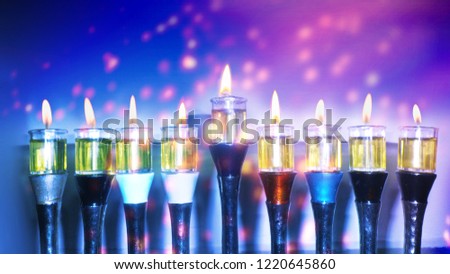 chanukiah (hanukkyah) - Hanukkah lamp, Olive oil candles.
Hanukkah Holiday.
8 candles