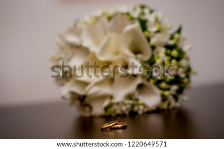 Beautiful bouquet of flowers and rings Wedding