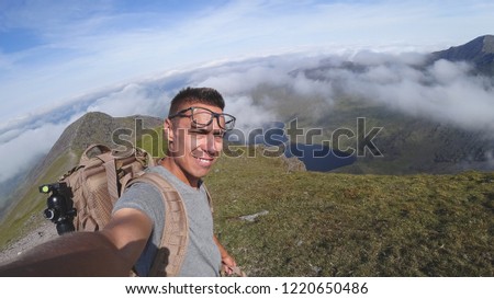 The man on the top of Carrauntoohil makes a selfie