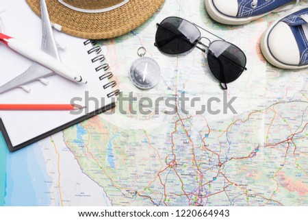 travel trip accessories  items travel concept on map background